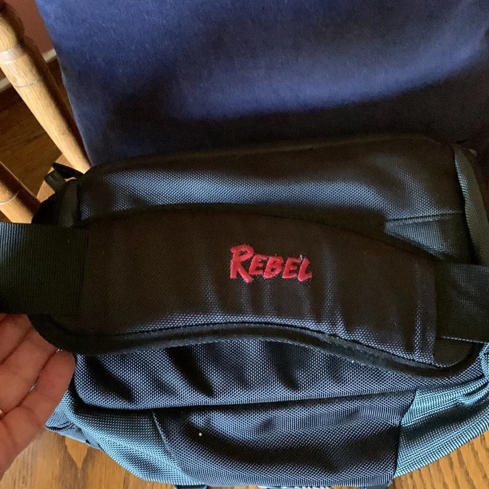 Canon camera bag with many pockets, zippers, straps, 5 inside compartments. EUC